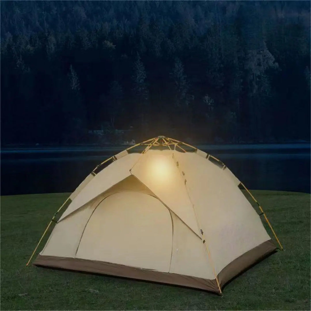 Camping tent with interior light in a forest setting