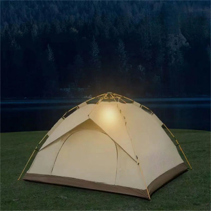 Camping tent with interior light in a forest setting