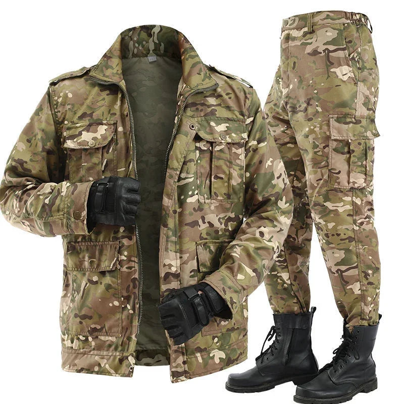 Camouflage military jacket, pants, gloves, and boots on a white background