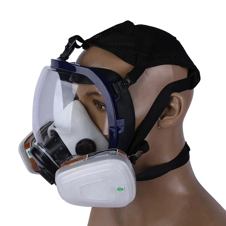 Full-face safety mask with clear visor on a mannequin head against a white background