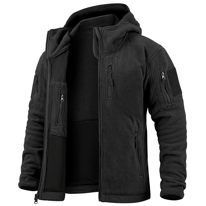 Black tactical jacket with multiple pockets and zippers on a white background