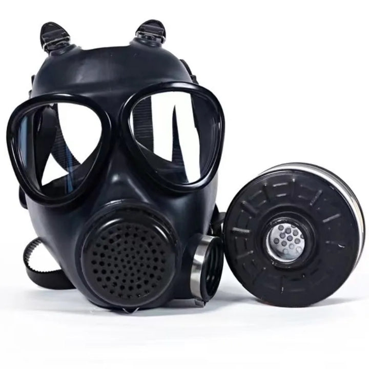 Black gas mask with clear visor on a white background