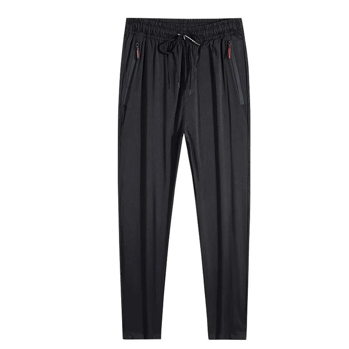 Black pants with drawstring on a white background