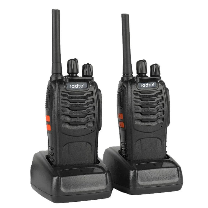 Two black walkie-talkies with antennas on a white background