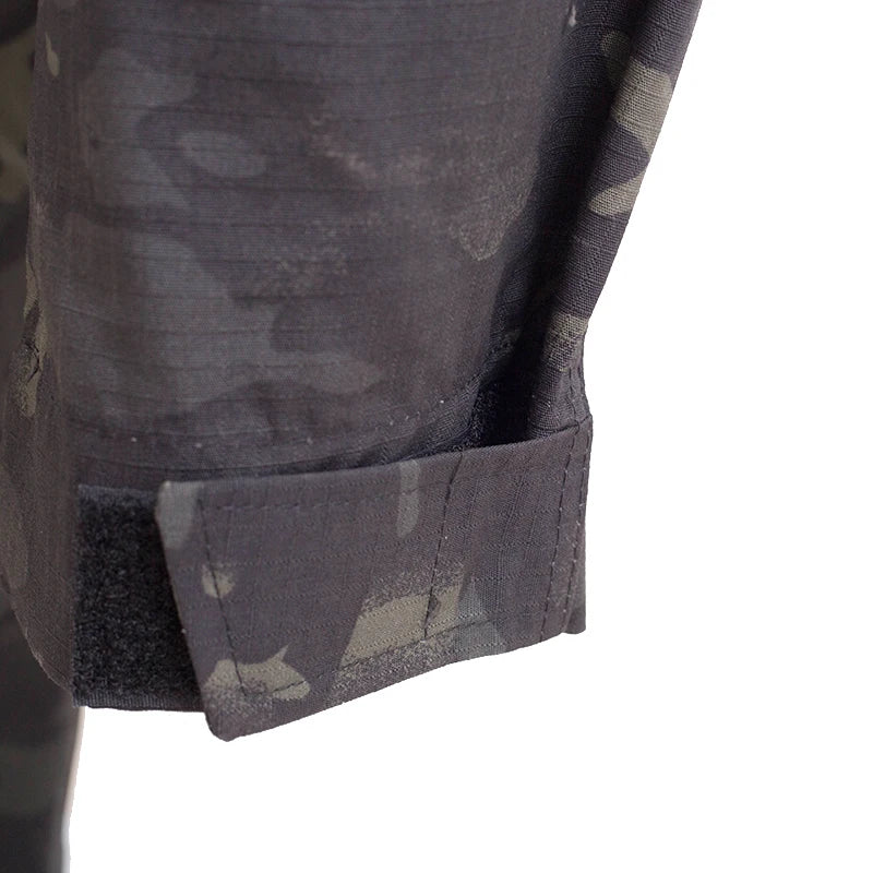 Close-up of a camouflage-patterned pocket on a jacket with a white background