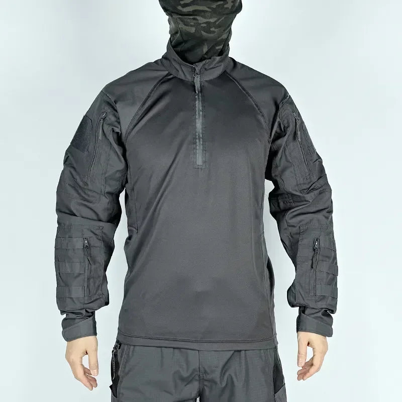 Dark gray tactical jacket with camouflage hood on a light gray background