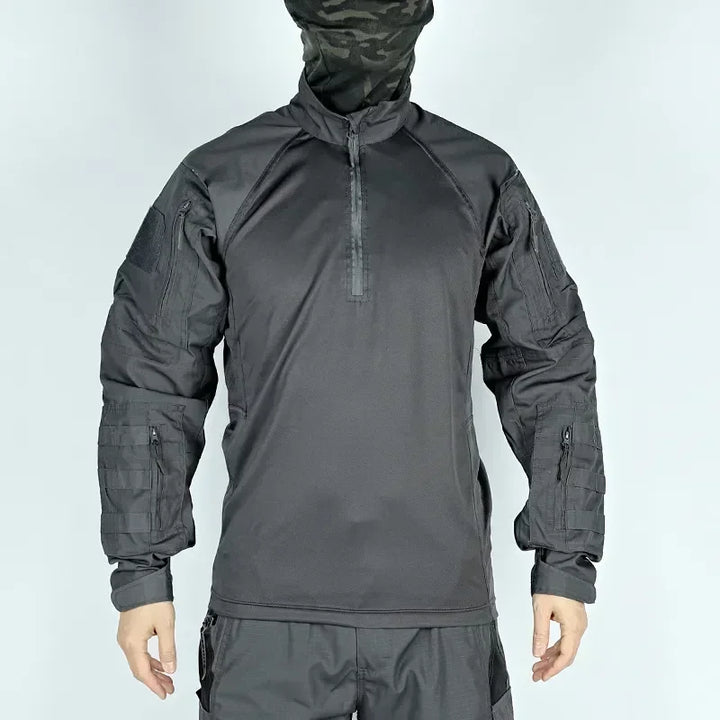 Dark gray tactical jacket with camouflage hood on a light gray background