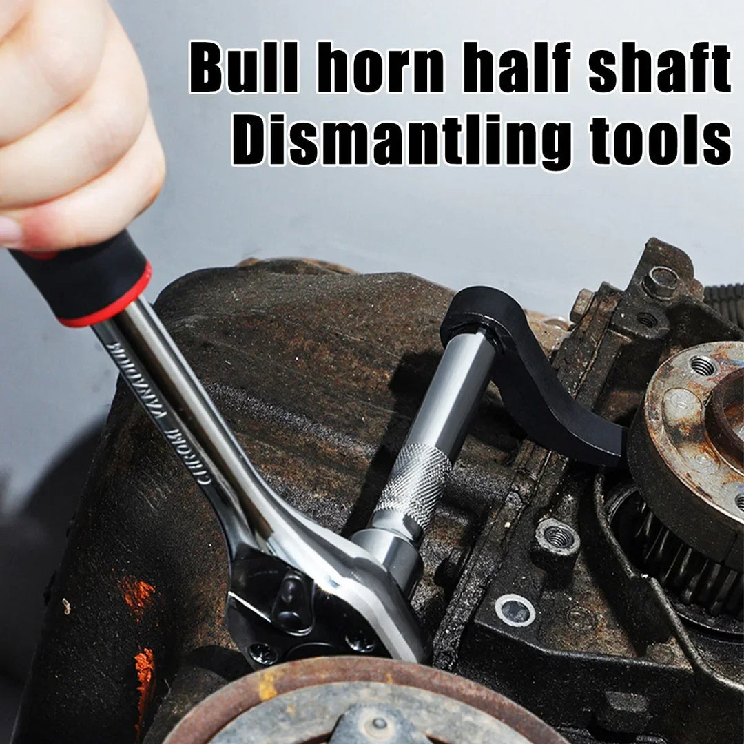 Hand using a tool to dismantle a vehicle's half shaft with text 'Bull horn half shaft Dismantling tools'.