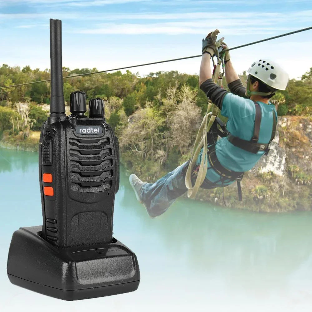 Baofeng walkie-talkie with a person on a zip line in the background