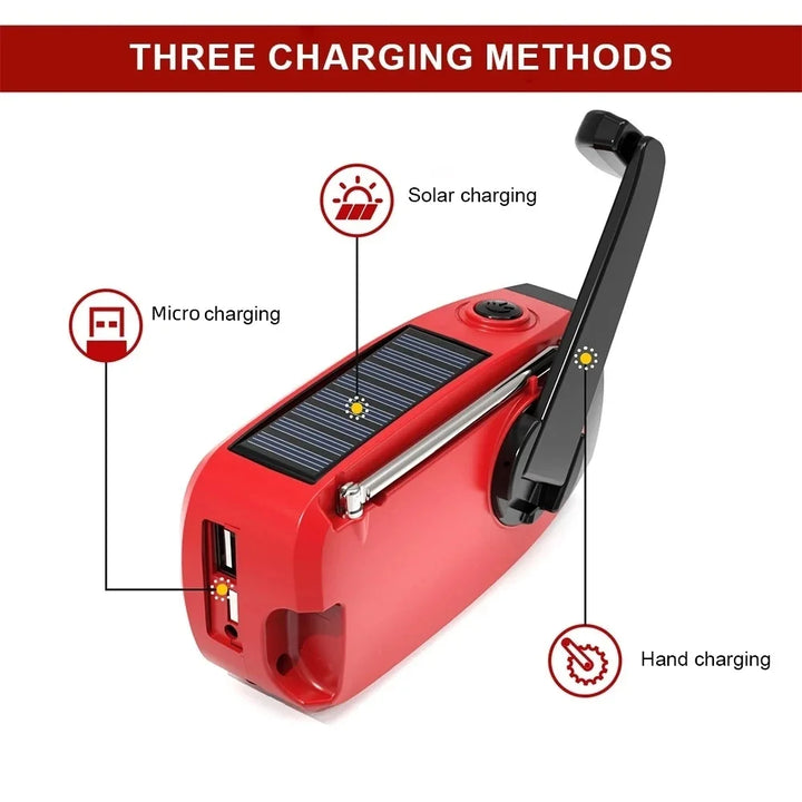 Red portable device with solar panel, USB port, and hand crank for charging, labeled 'Three Charging Methods'.