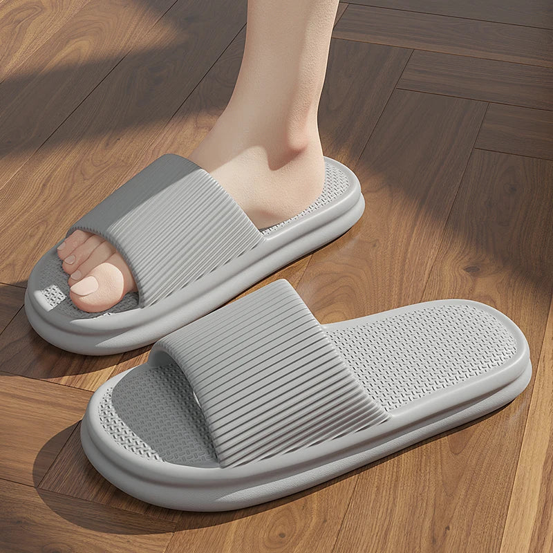 Gray slippers on a wooden floor