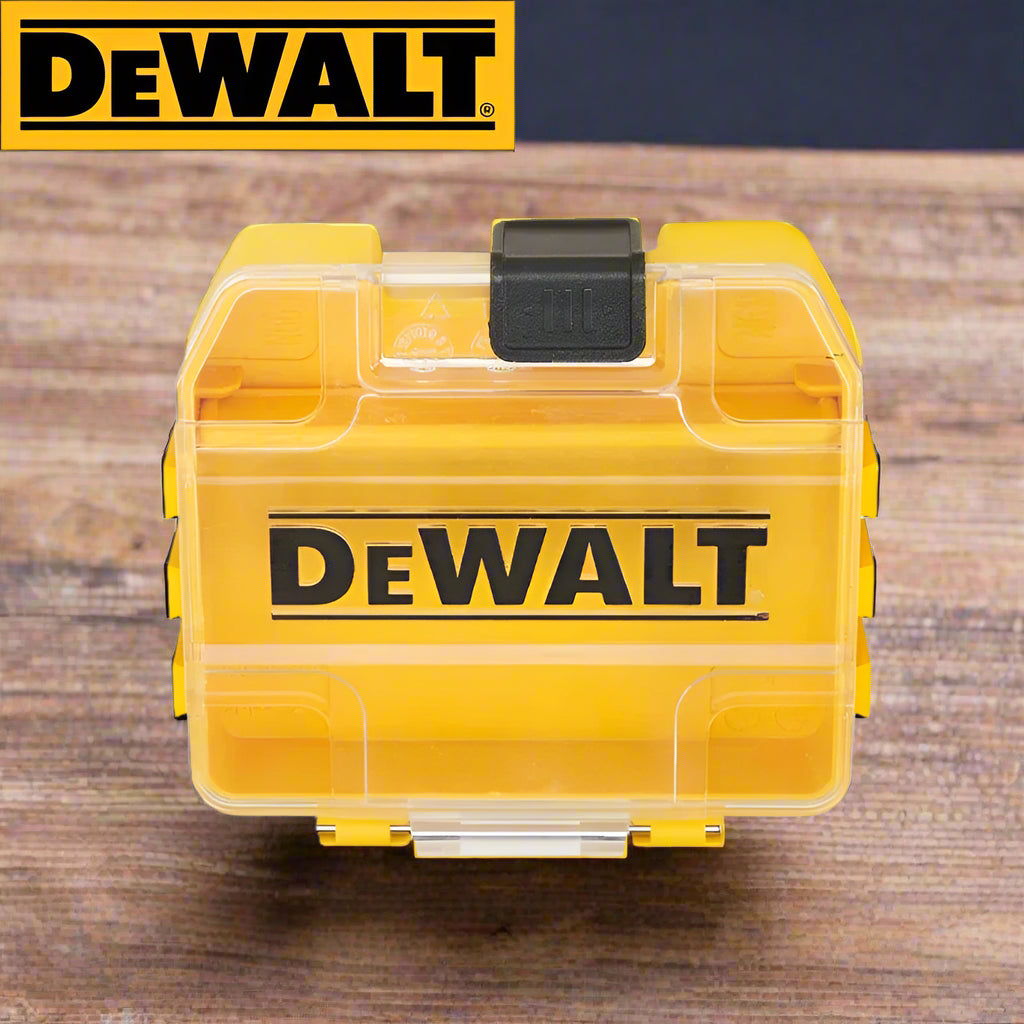 Closed DEWALT case with transparent lid and bold logo on wood surface
