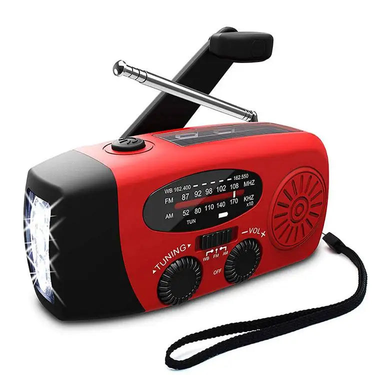 Red and black emergency radio with flashlight on a white background