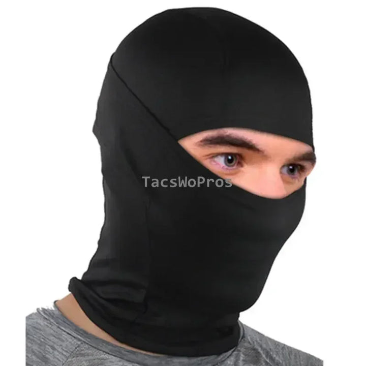 Person wearing a black balaclava with 'TacswoPros' branding on a white background