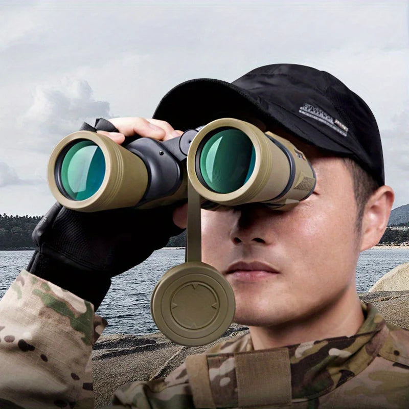 Person in camouflage holding binoculars with a scenic background