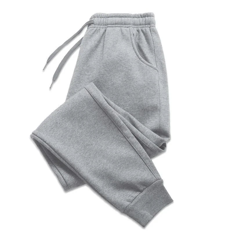 Pair of joggers displayed folded with waistband visible