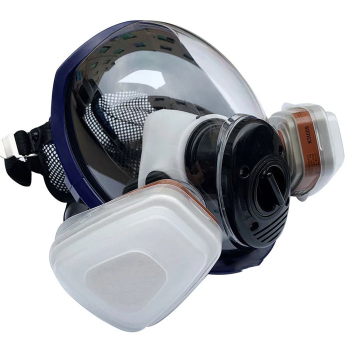 Full-face respirator mask with filter on a white background