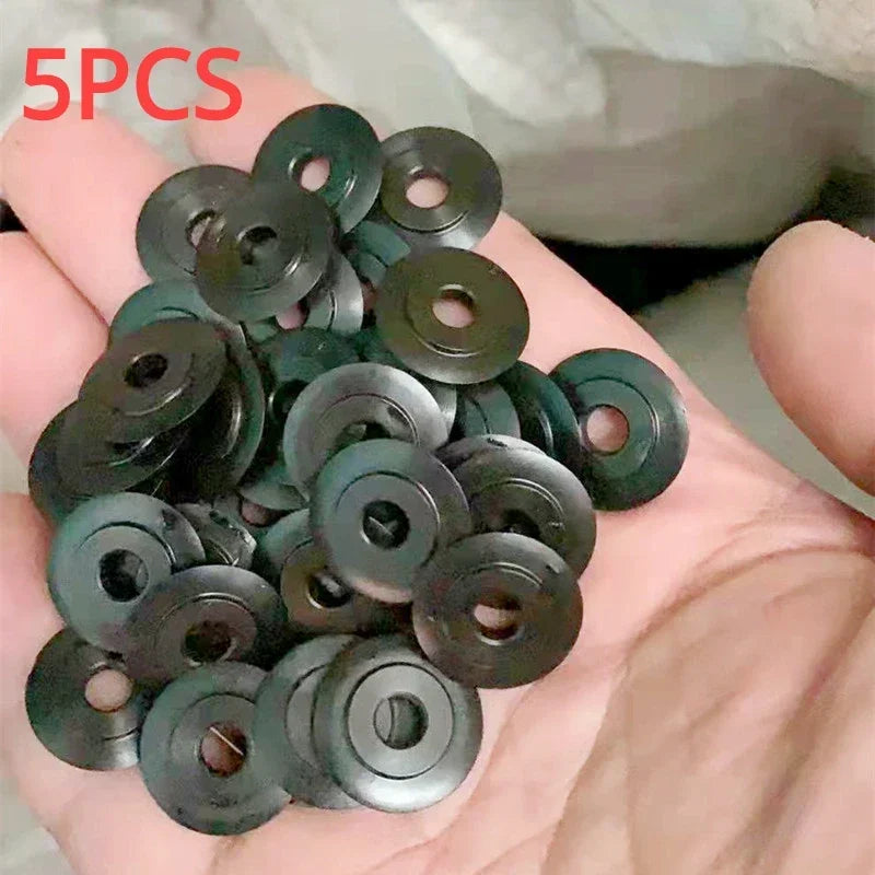 Hand holding a pile of green metal washers with '5PCS' text above.