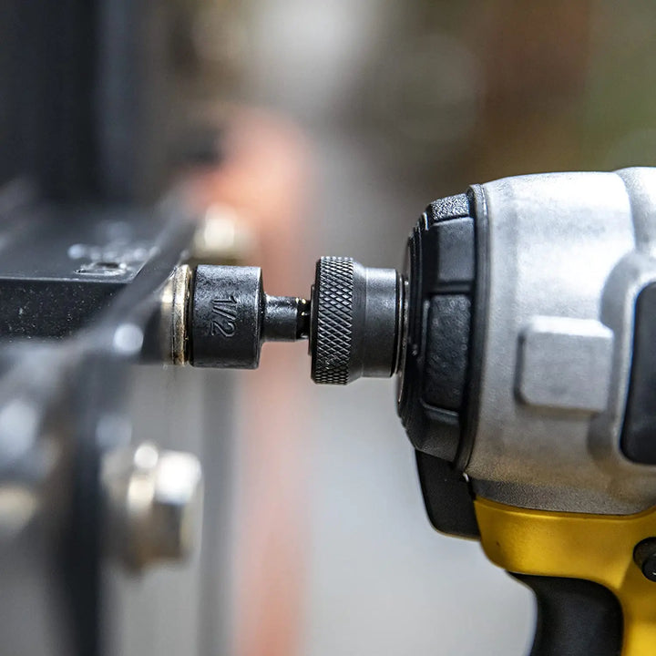 Compact pipe cutter shown next to plumbing tools