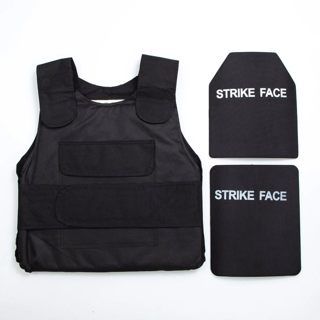 Black bulletproof vest and two ballistic plates on a white background