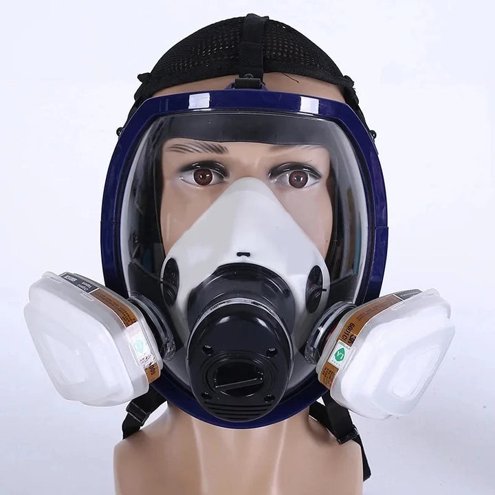 Full-face respirator mask on a mannequin head against a white background