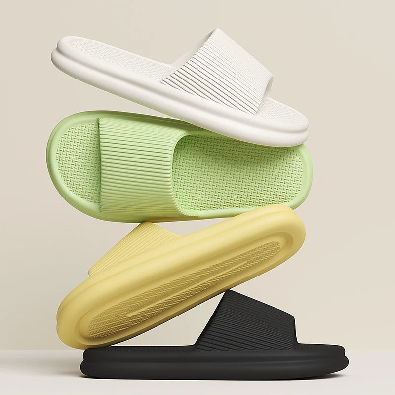 Four slides in white, green, yellow, and black stacked on a beige background