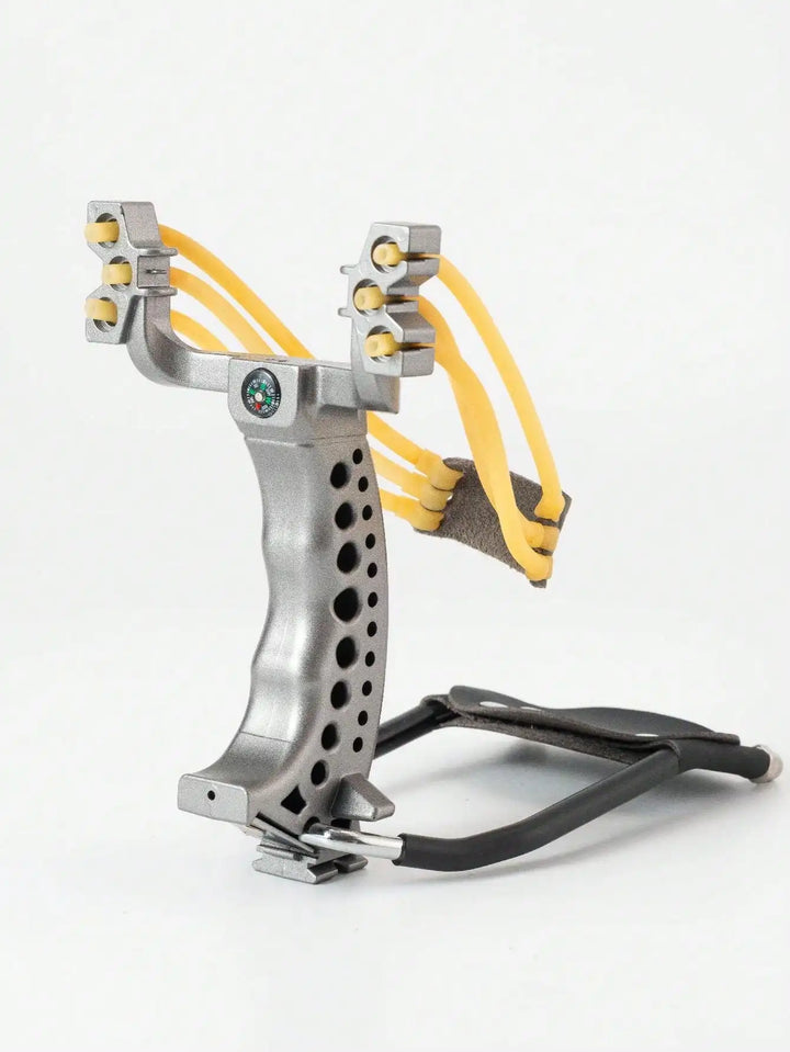 Metal slingshot with yellow springs on a white background