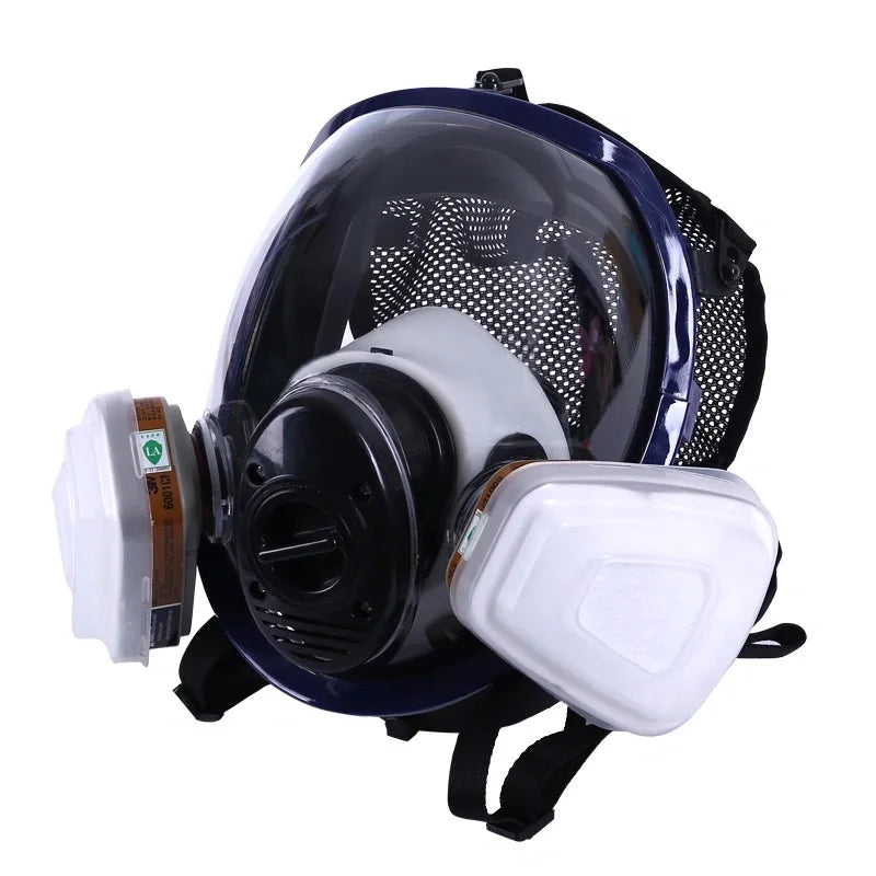 Full-face respirator mask with clear visor and white filter on a white background