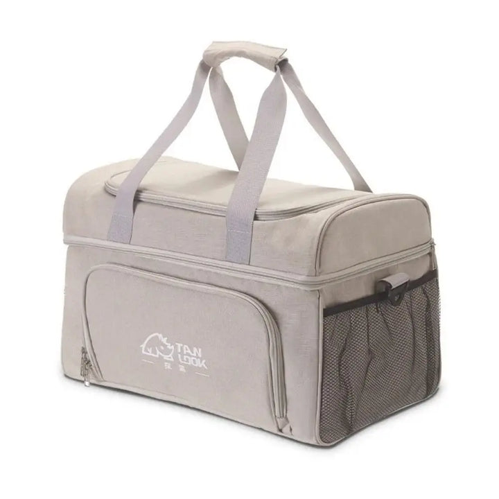 Gray pet carrier with a visible brand logo on a white background