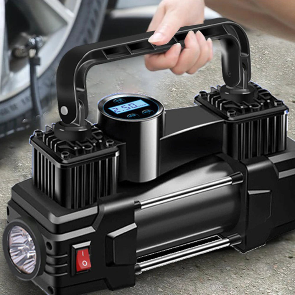  Heavy-duty 12V air compressor with dual cylinders and LED light, placed next to a car tire for quick inflation