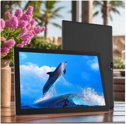 A 10.1-inch HD tablet showing a vibrant dolphin splash animation, displayed on a patio table next to a blooming pink flower vase with palm trees in the background.