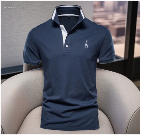 Navy blue polo shirt displayed on a modern outdoor café patio, with warm sunlight, coffee on the table, and city life in the background.