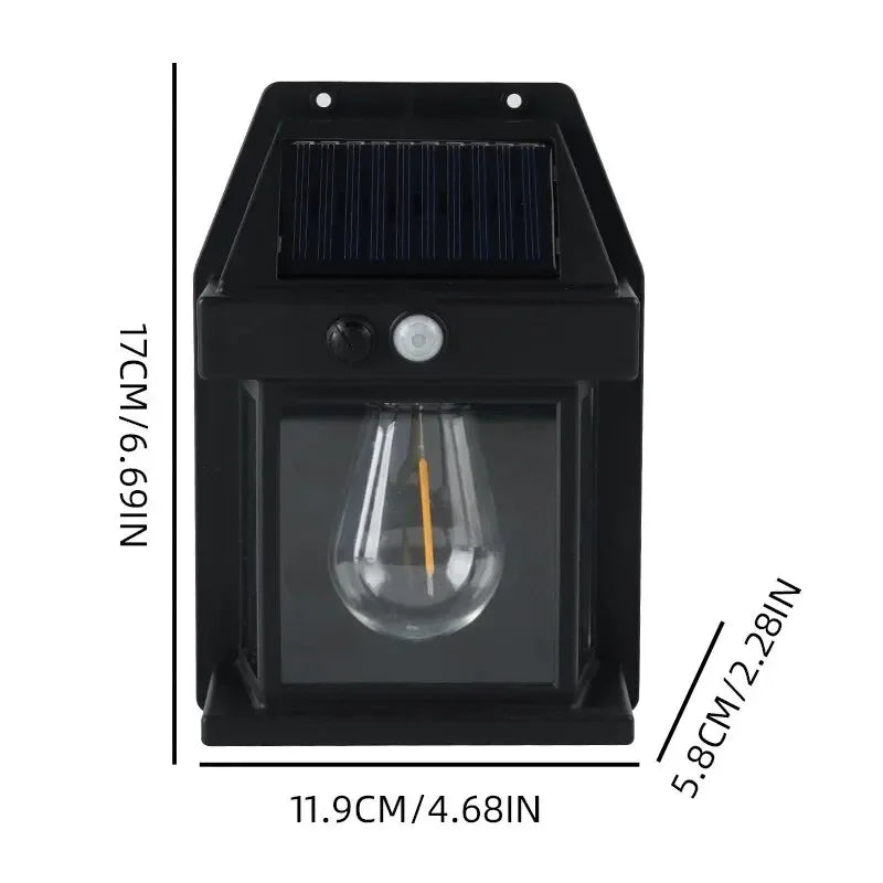  A close-up of the solar induction lamp, showcasing its sleek black design and LED motion sensor.