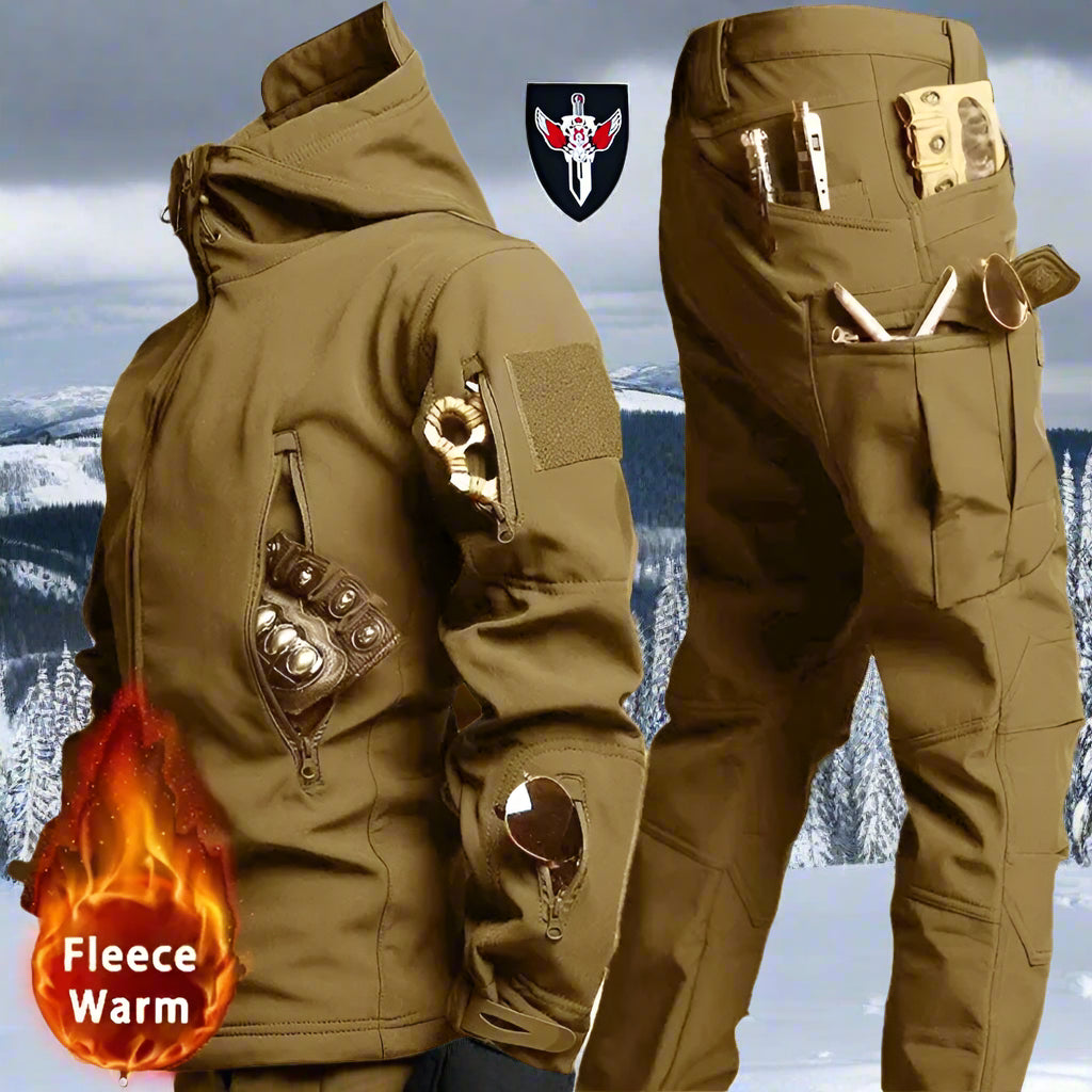 Khaki-colored tactical jacket and pants combo, fleece-lined and weatherproof, featuring multi-pocket design and utility clips, shown with a snowy mountain landscape in the background.