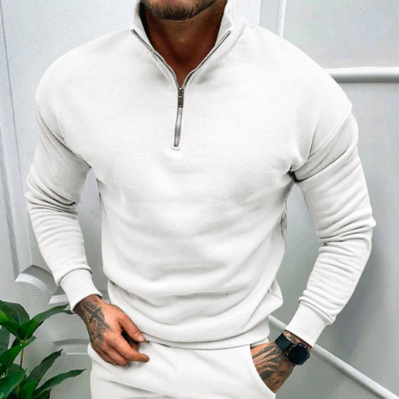 Clean and crisp white quarter-zip pullover with a modern design, perfect for pairing with any wardrobe.