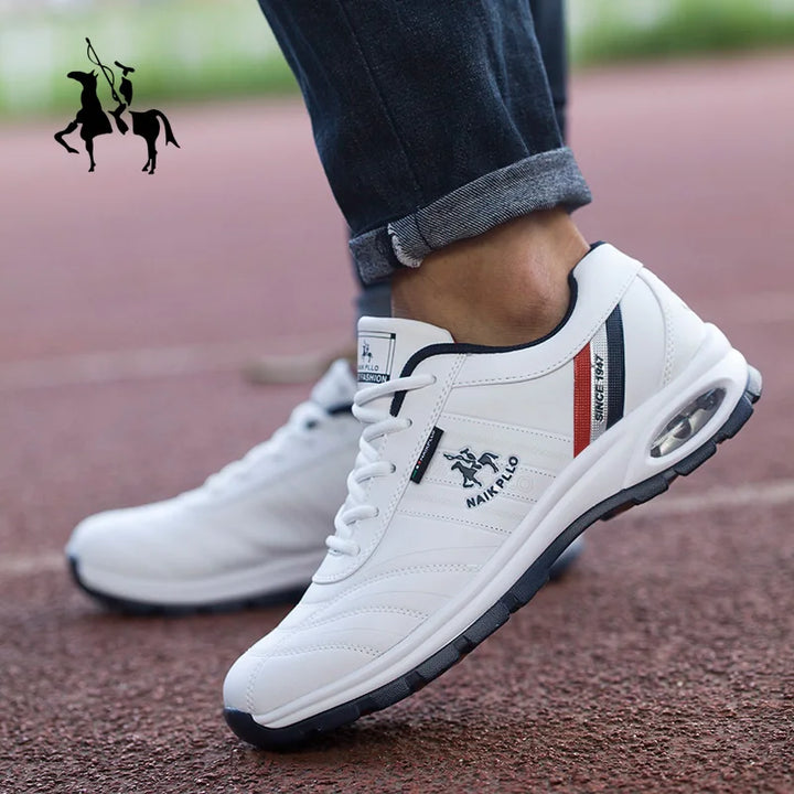 Casual white sneakers worn with jeans and a relaxed outfit, ideal for everyday wear.