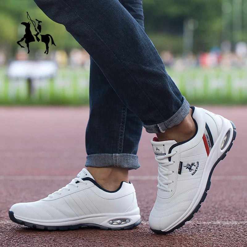  White sneakers captured on a running track, showcasing their sporty and lightweight feel.
