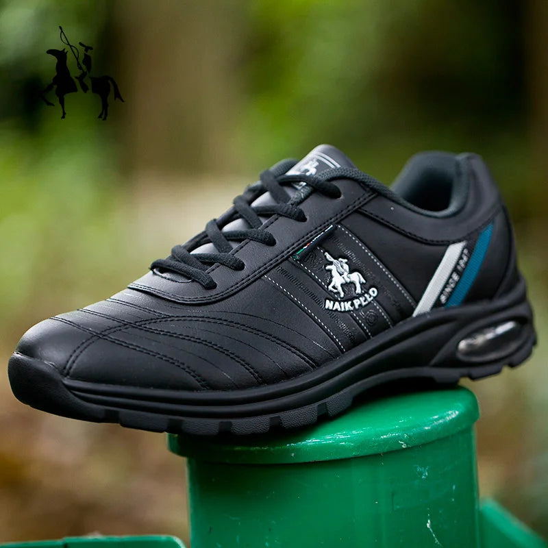  Side view of black sneakers, highlighting breathable design and structure.