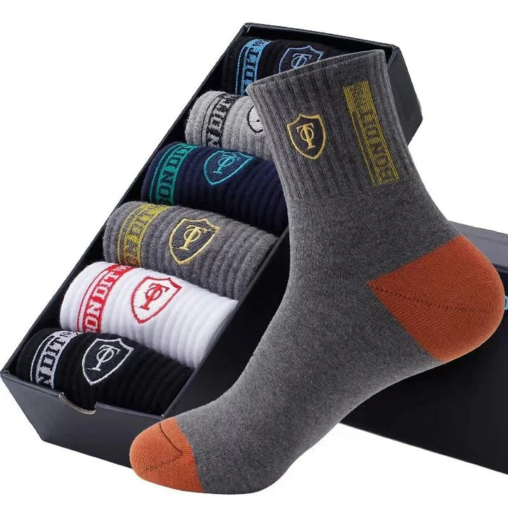 A premium set of men's casual cotton socks neatly packed in a stylish gift box.