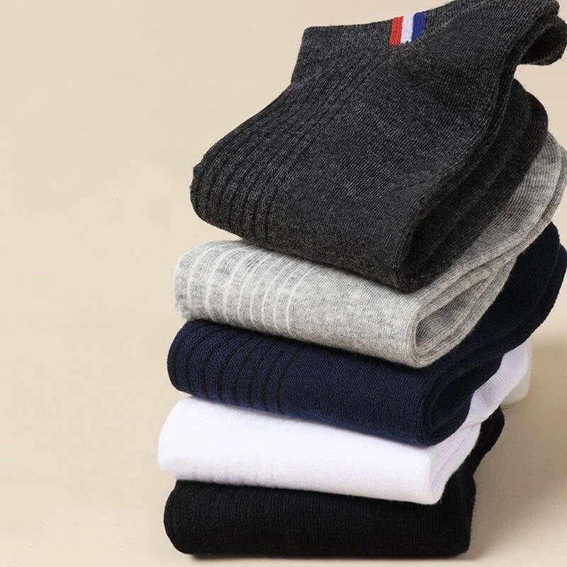 A set of stacked boat socks in different colors, highlighting the ribbed design and soft texture.