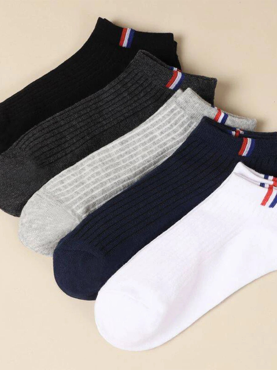 A 5-pack of breathable men's boat socks in dark and neutral shades.
