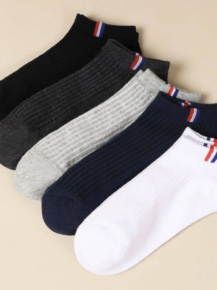 A 5-pack of breathable men's boat socks in dark and neutral shades.